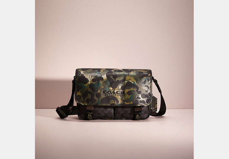 COACH®,RESTORED LEAGUE MESSENGER BAG IN SIGNATURE CANVAS WITH CAMO PRINT,Signature Coated Canvas,Medium,Charcoal Multi,Front View