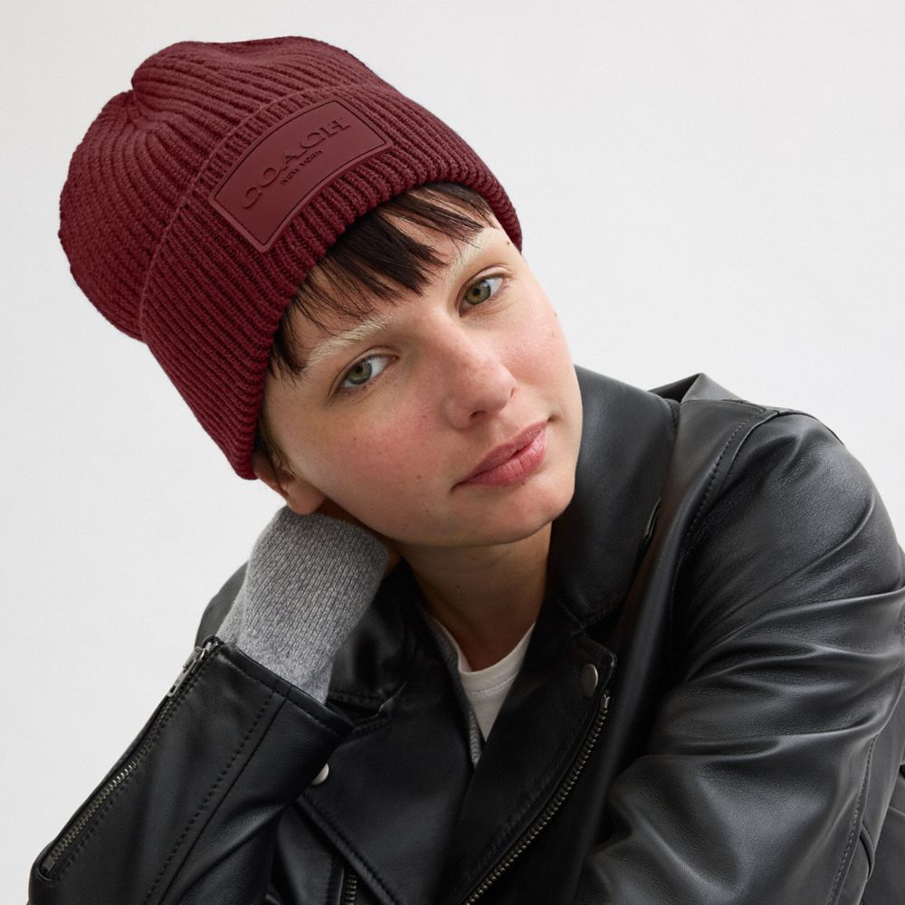 COACH®,Knit Beanie With Rubber Patch,Wool,Beanie,Ribbed,Logo,Applique,Casual,Maroon,Angle View