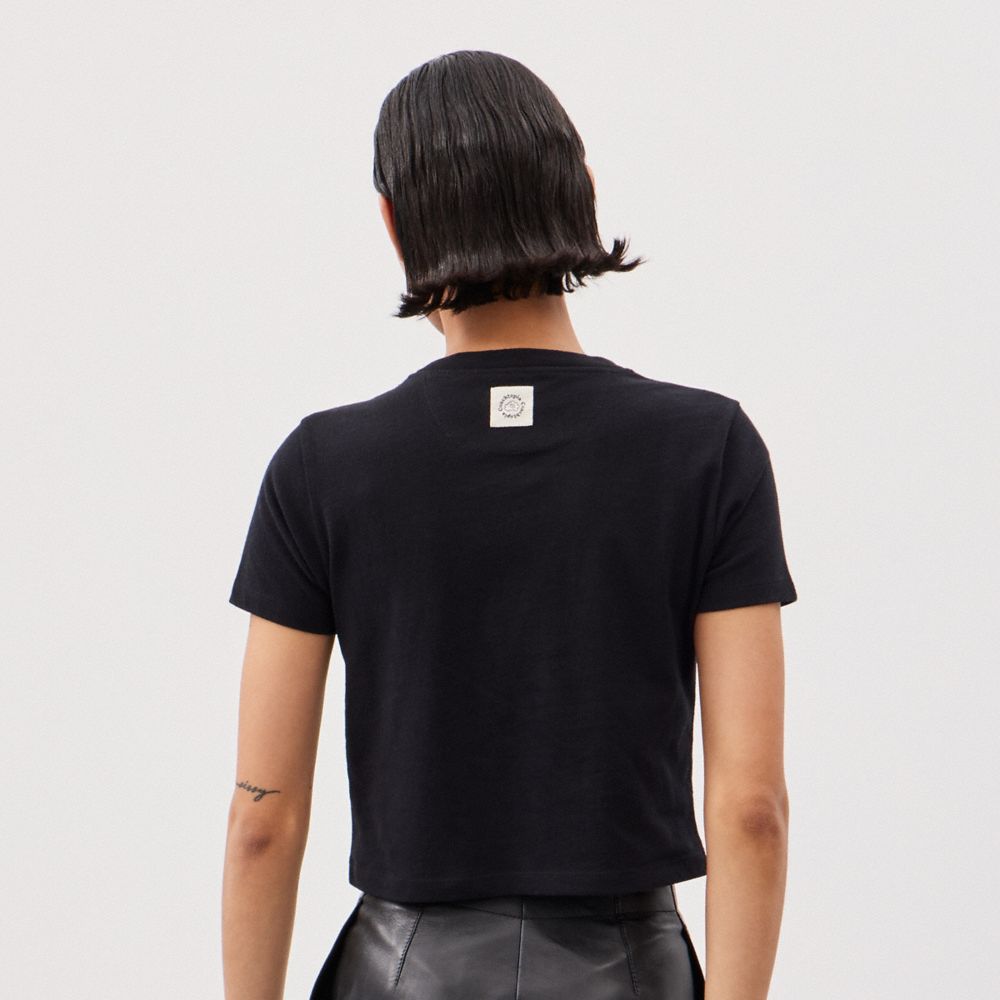 COACH®,Cropped T Shirt With This Is Coachtopia Print,Recycled Cotton,Recycled Polyester,Nylon,Cotton,T Shirt,Word Embellis...,Black,Scale View