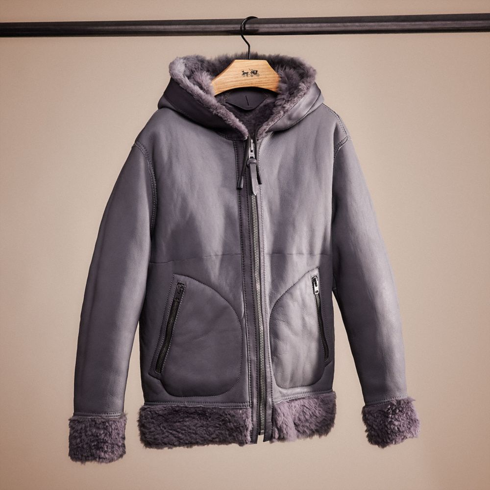 COACH®: Reversible Shearling Hoodie