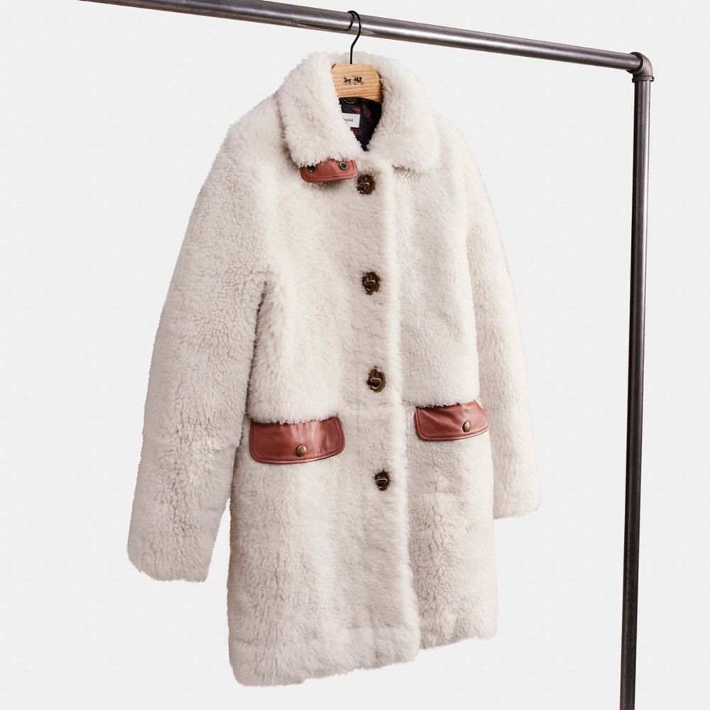 White shearling outlet coat