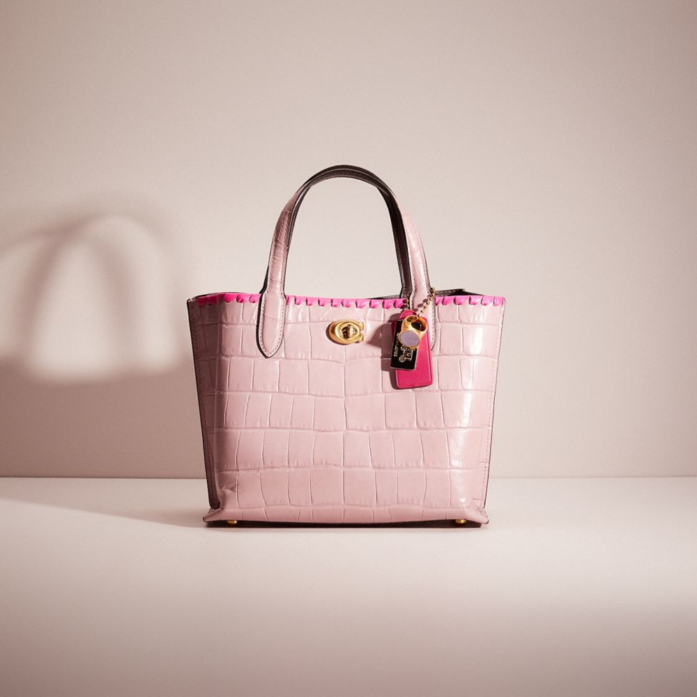 Coach pink hot sale flamingo purse