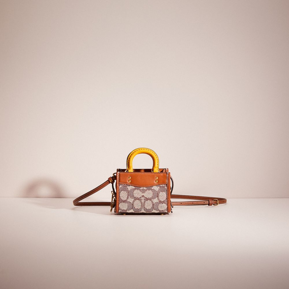 Coach Mini Signature Jacquard Small Wristlet, Cocoa Burnished Amber:  Handbags