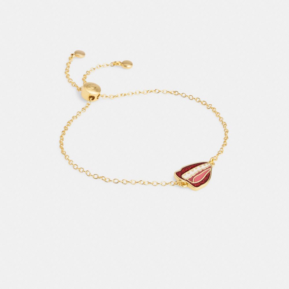 Shop Coach Outlet X Tom Wesselmann Lips Slider Bracelet In Red