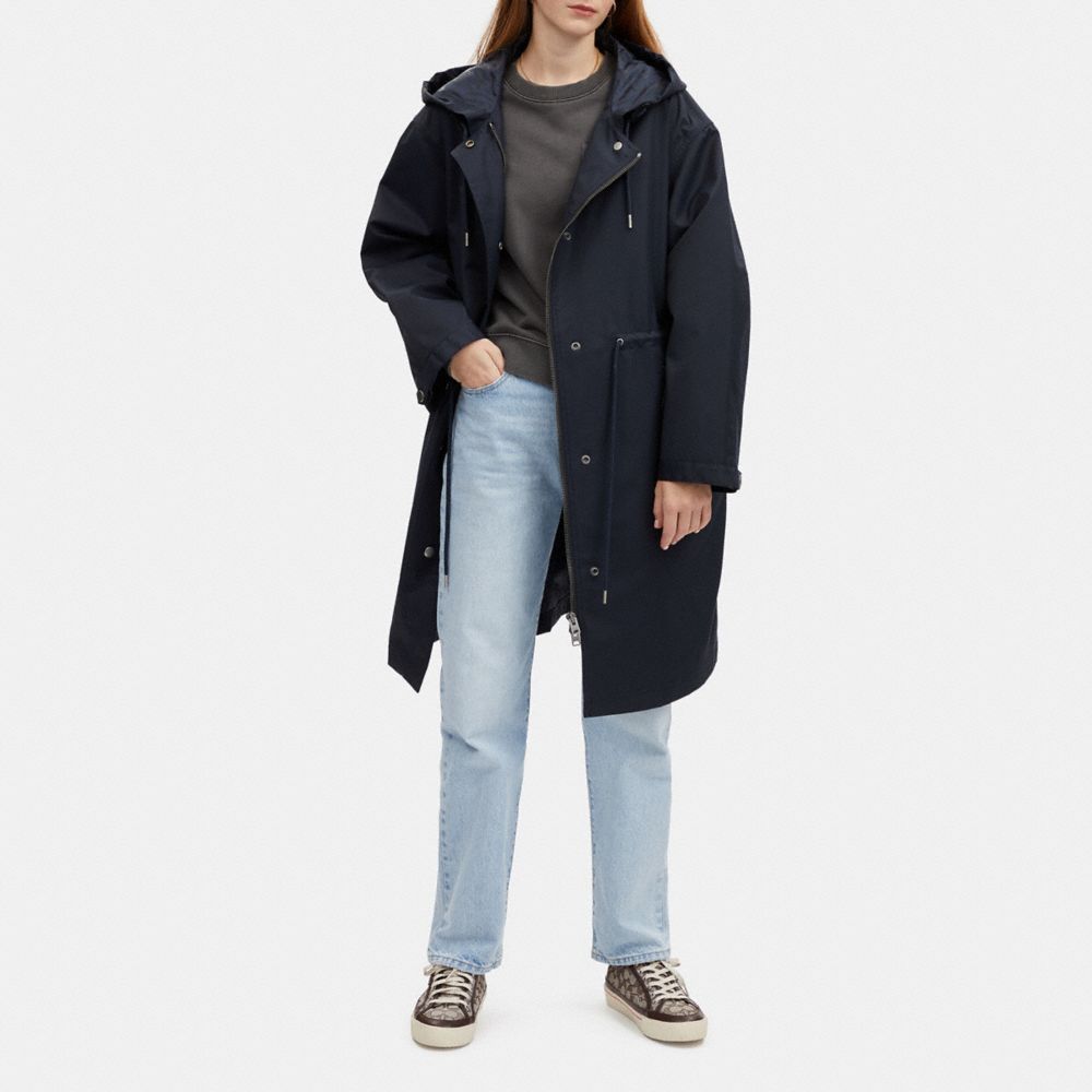 Coach raincoat store with hood