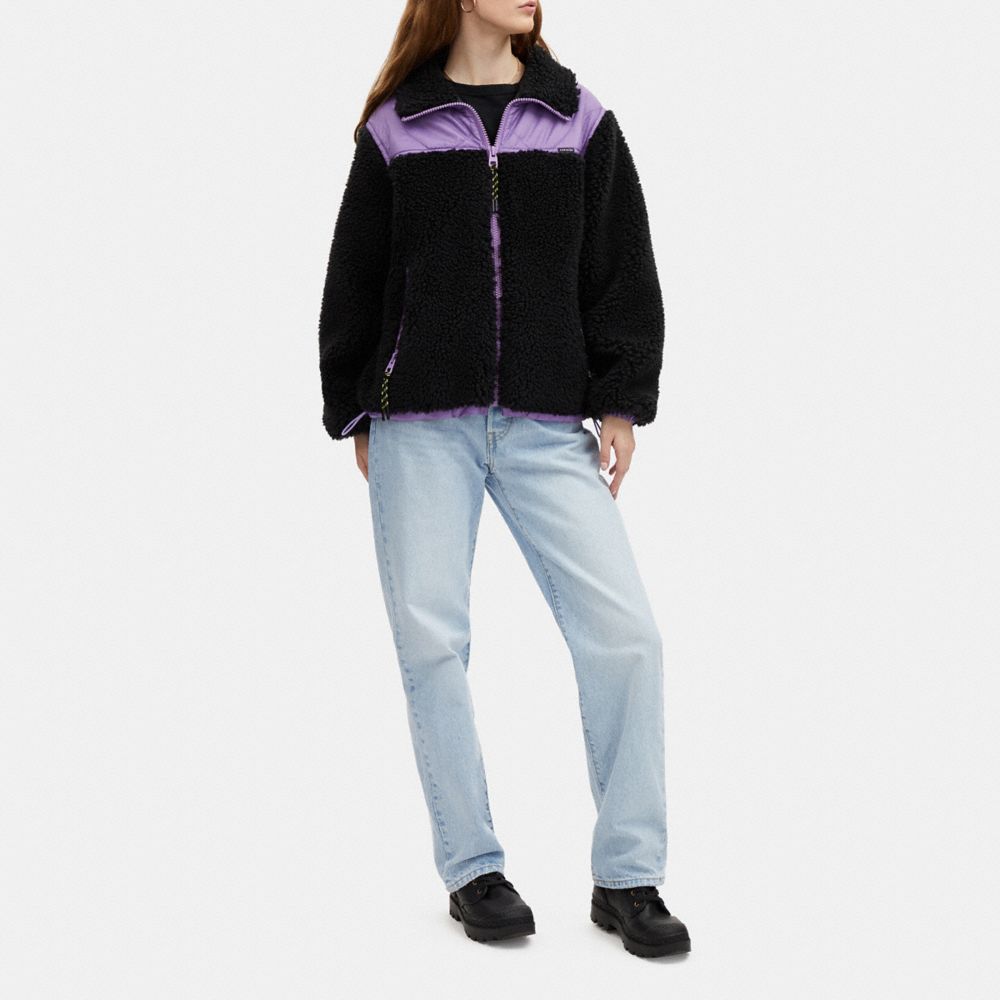 COACH® | Quilted Sherpa Zip Up