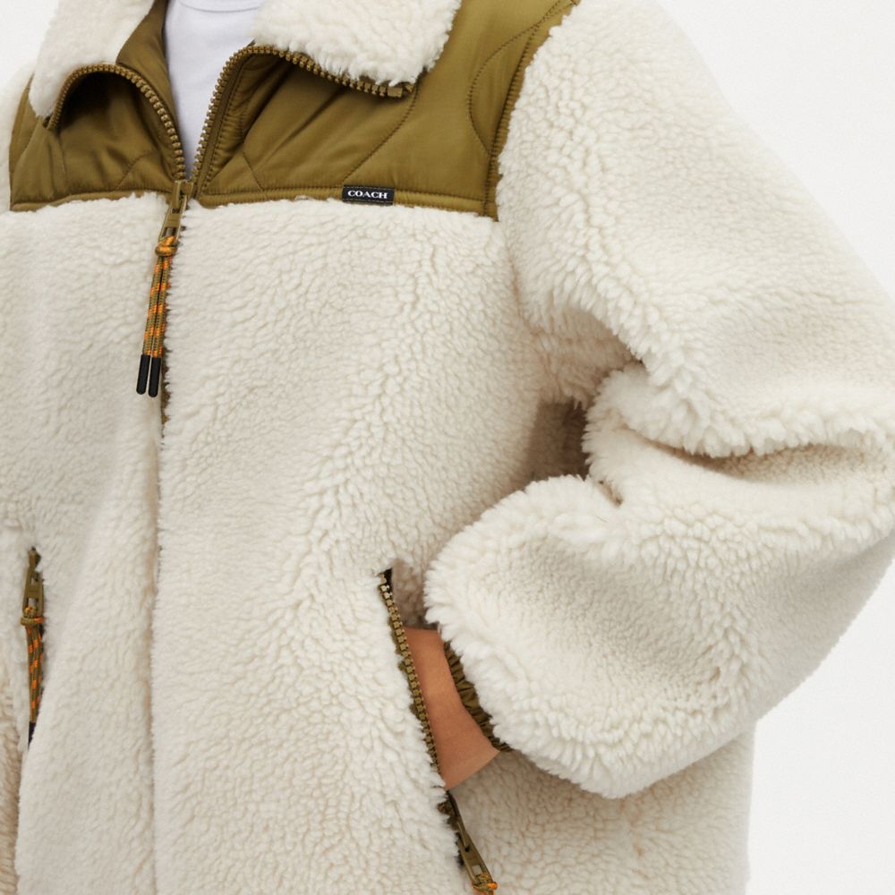 COACH®  Quilted Sherpa Zip Up