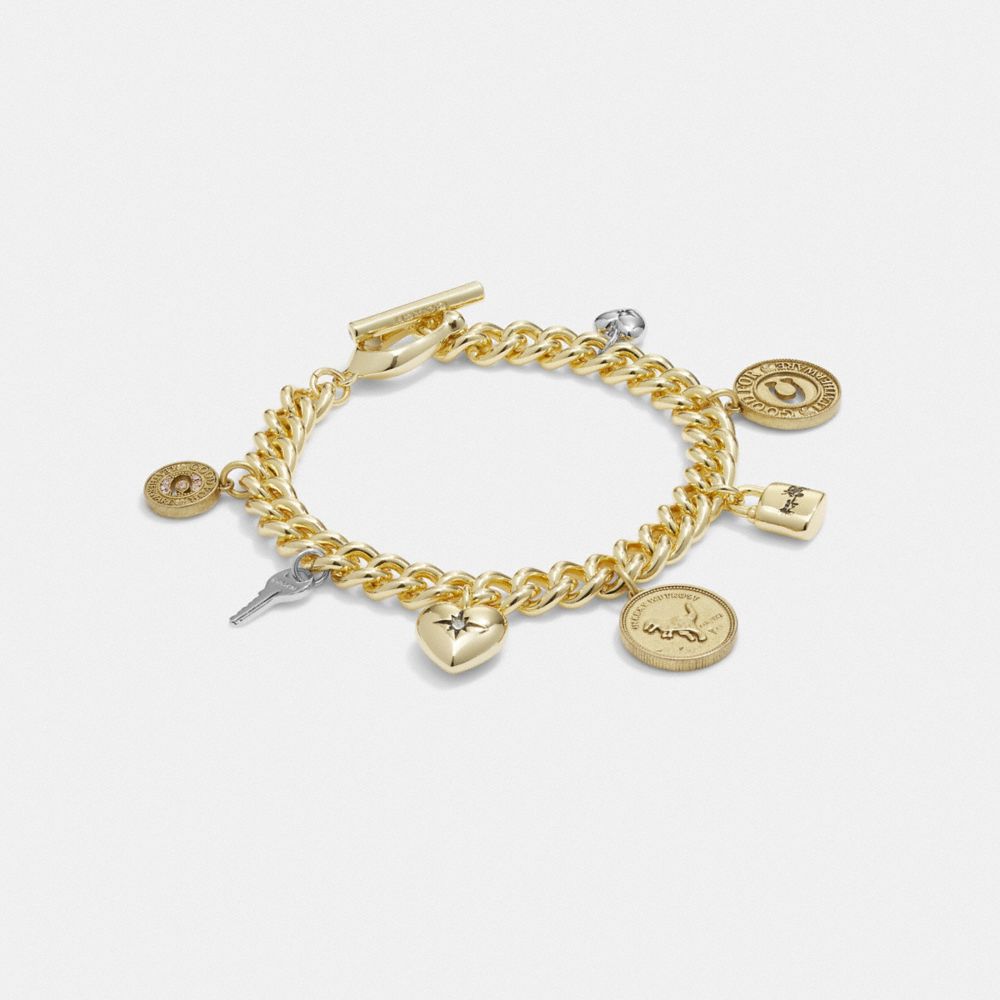 COACH®,SIGNATURE COIN CHARM BRACELET,Plated Brass,Gold/Silver,Front View image number 0