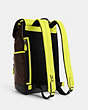 COACH®,TRACK BACKPACK IN COLORBLOCK SIGNATURE CANVAS,Coated Canvas/Signature Canvas/Smooth Leather,X-Large,Black Antique Nickel/Mahogany/Bright Yellow,Angle View