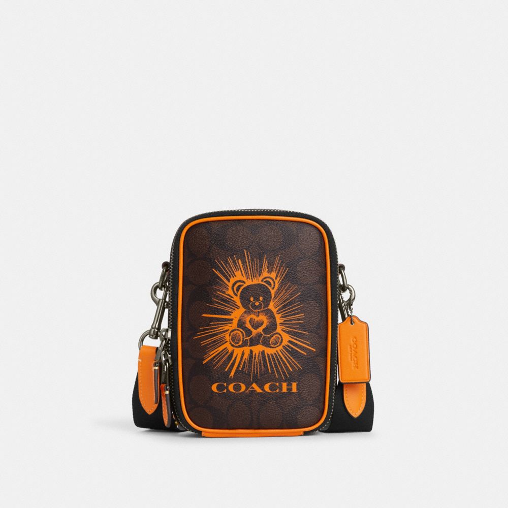 COACH®,STANTON CROSSBODY IN SIGNATURE CANVAS WITH BEAR,Mini,Black Antique Nickel/Mahogany/Bright Mandarin,Front View image number 0