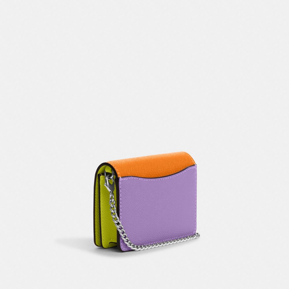 COACH®,MINI WALLET ON A CHAIN IN COLORBLOCK,Novelty Leather,Silver/Bright Yellow Multi,Angle View