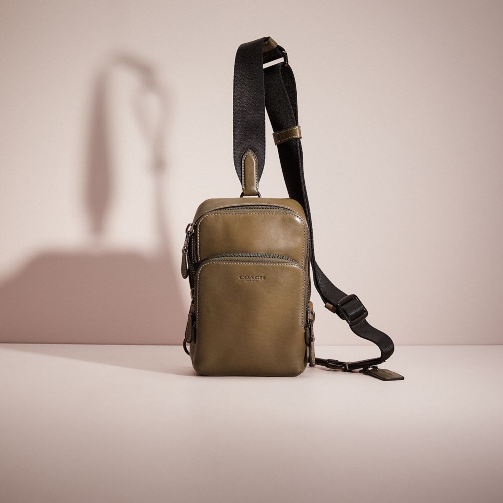 COACH®: Gotham Sling Pack 13 In Signature Canvas