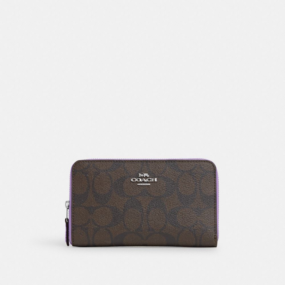 Zip around coin 2025 case in signature canvas