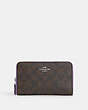 COACH®,MEDIUM ID ZIP WALLET IN SIGNATURE CANVAS WITH COLORBLOCK INTERIOR,Coated Canvas/Signature Canvas/Smooth L...,Silver/Brown/Iris Multi,Front View