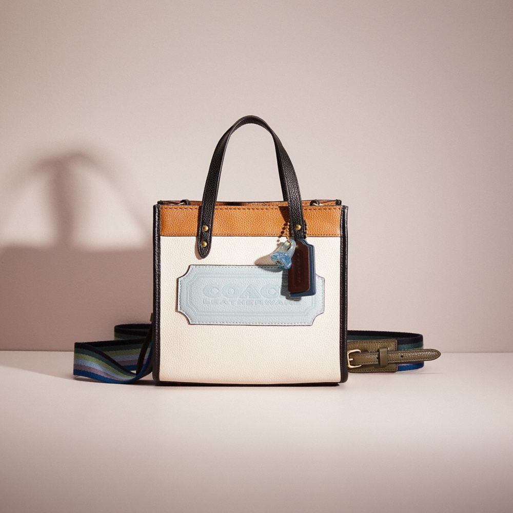 coach field tote 22 with colorblock leather and coach badge