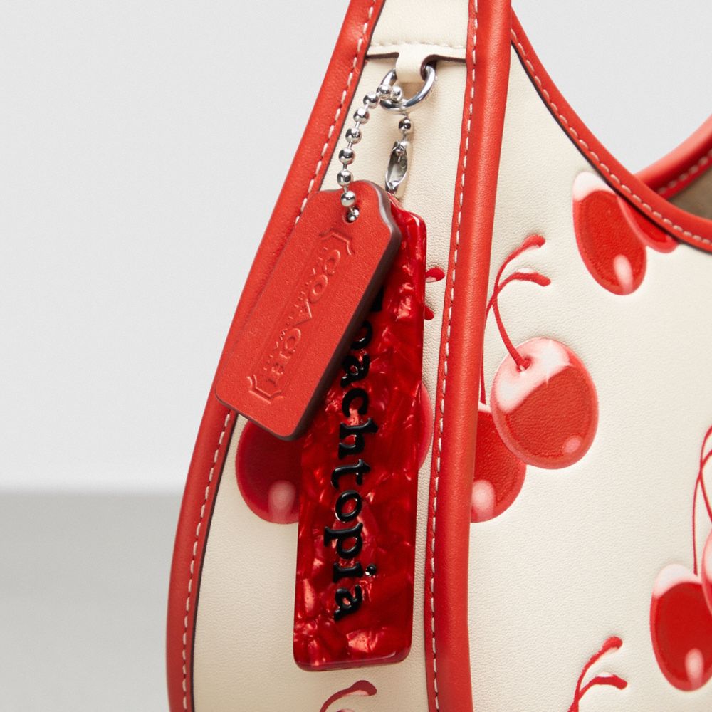 Ergo Bag In Coachtopia Leather With Cherry Print