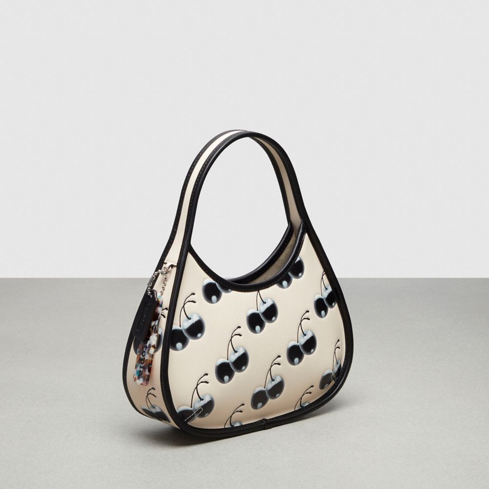 COACH®,Ergo Bag In Coachtopia Leather With Cherry Print,Coachtopia Leather,Small,Cherry Print,Black/Cloud Multi,Angle View
