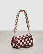COACH®,Wavy Dinky Bag in Patchwork Checkerboard Upcrafted Leather,Upcrafted Leather™,Small,Checkerboard,Wine/Pink,Angle View
