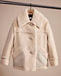 COACH®,RESTORED SHORT SHEARLING COAT WITH PRINTED LINING,Glovetanned Leather,Vintage White,Front View