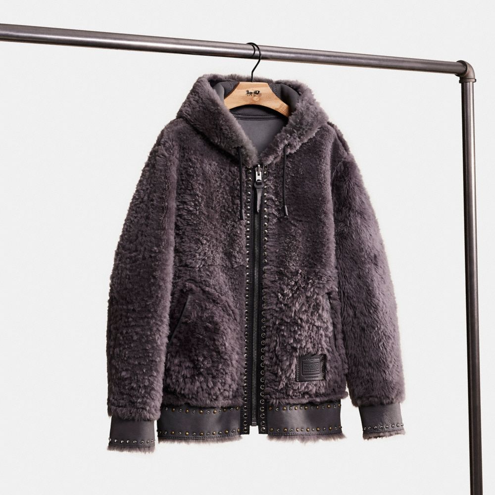 COACH®: Reversible Shearling Hoodie