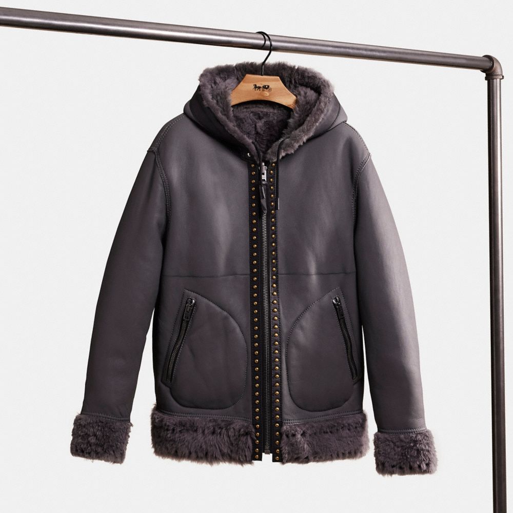 COACH®: Reversible Shearling Hoodie