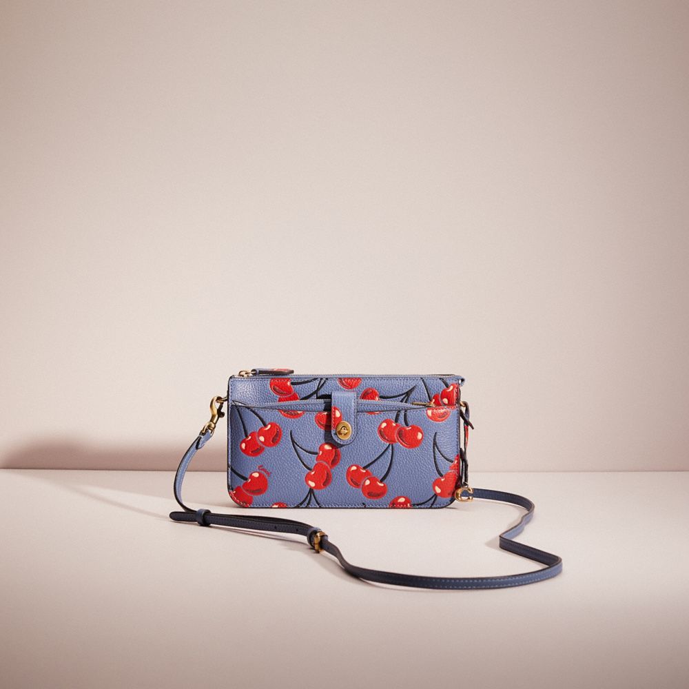 Coach Noa popular Pop Up Messenger With Cherry Print