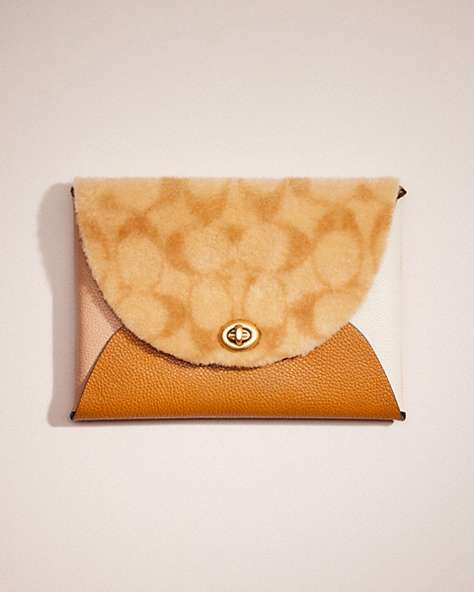 COACH®,REMADE COLORBLOCK LARGE SIGNATURE SHEARLING POUCH,Leather,Beige Multi,Front View