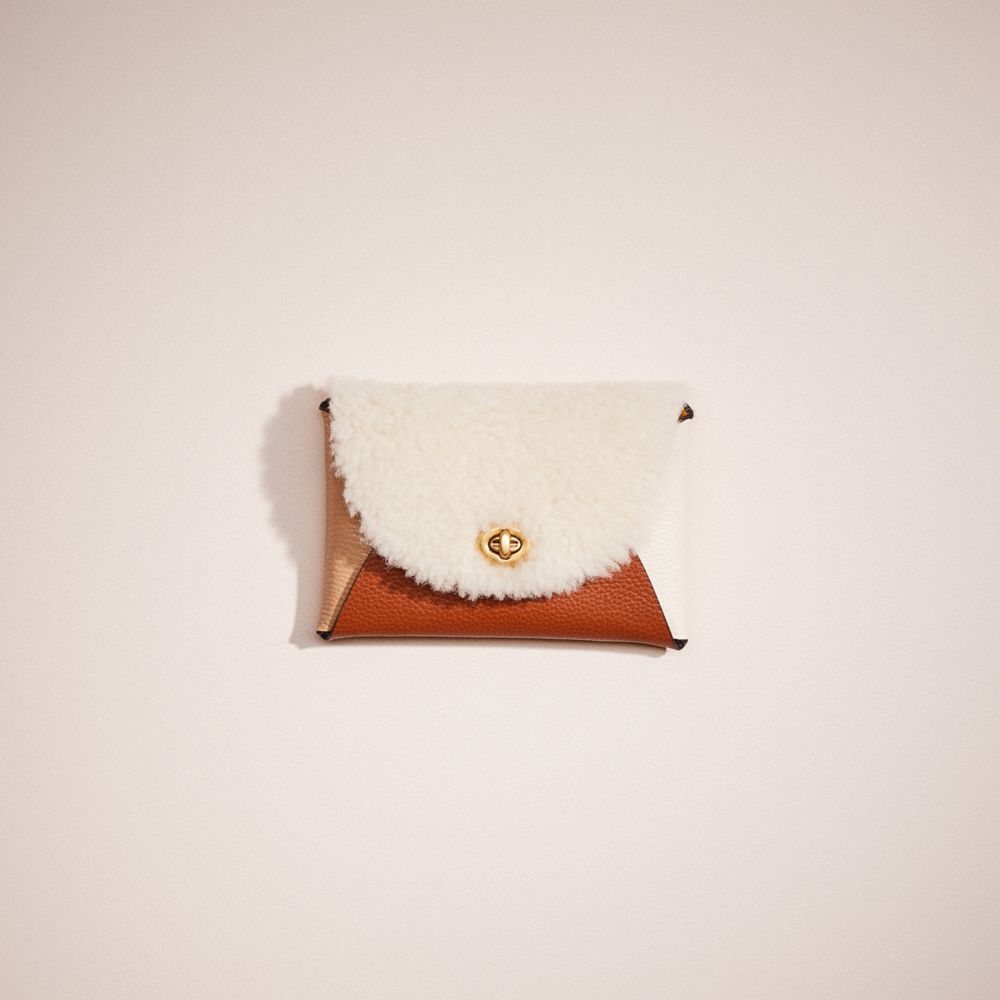 COACH®,REMADE COLORBLOCK MEDIUM SIGNATURE SHEARLING POUCH,Glovetanned Leather,Beige Multi,Front View
