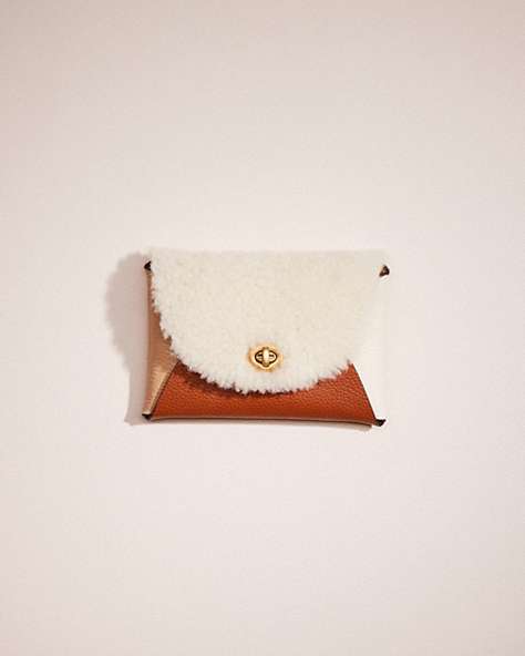 COACH®,REMADE COLORBLOCK MEDIUM SIGNATURE SHEARLING POUCH,Glovetanned Leather,Beige Multi,Front View