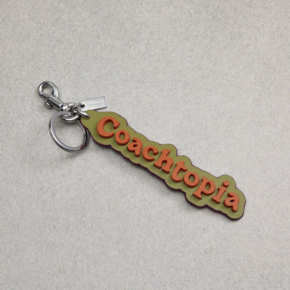 COACH®,Coachtopia Bag Charm In Coachtopia Leather,Coachtopia Leather,Olive Green Multi,Front View image number 0