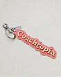 COACH®,Coachtopia Bag Charm in Coachtopia Leather,Coachtopia Leather,Strawberry Haze/Lime Green,Front View
