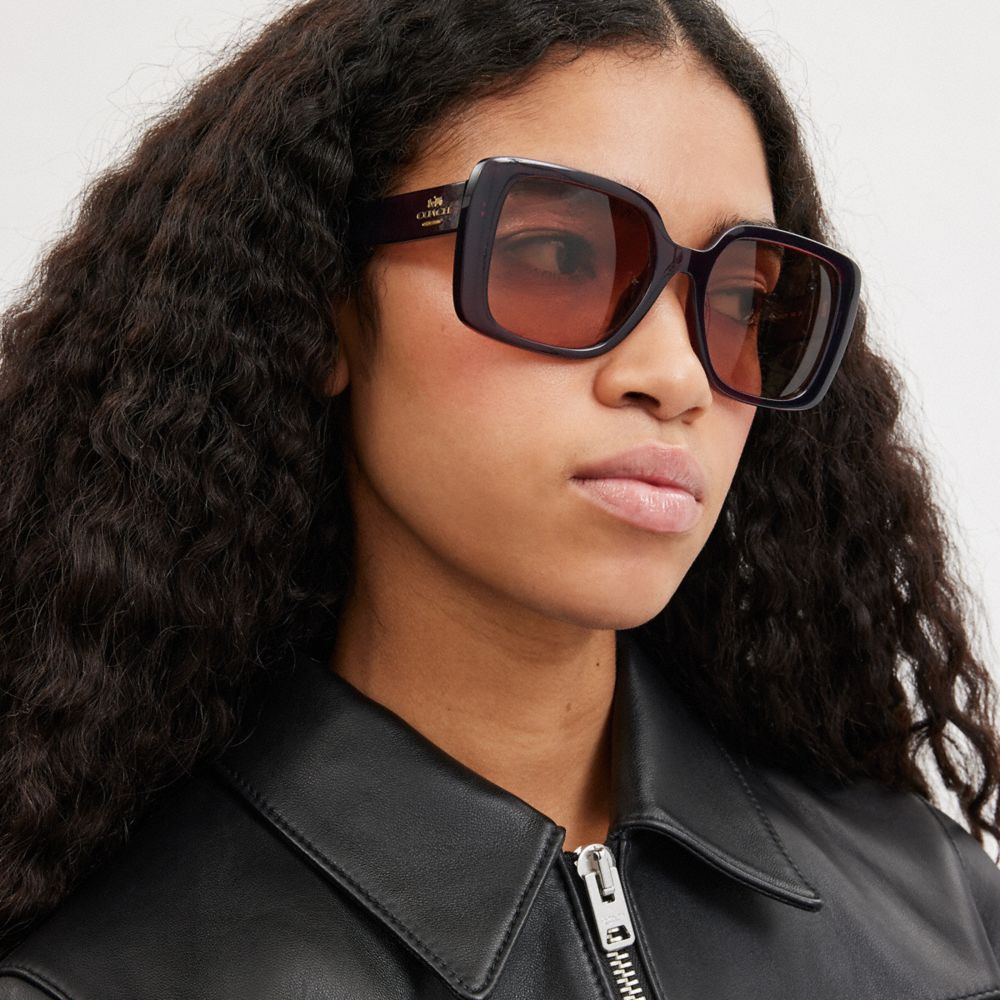 COACH®,OVERSIZED SQUARE SUNGLASSES,Transparent Caramel,Angle View