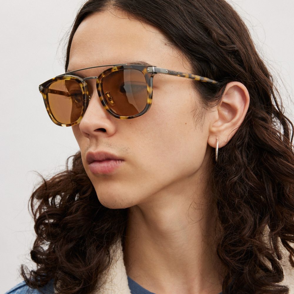 COACH®,WRAP-AROUND HANGTAG BROWBAR SUNGLASSES,Honey Tortoise,Angle View