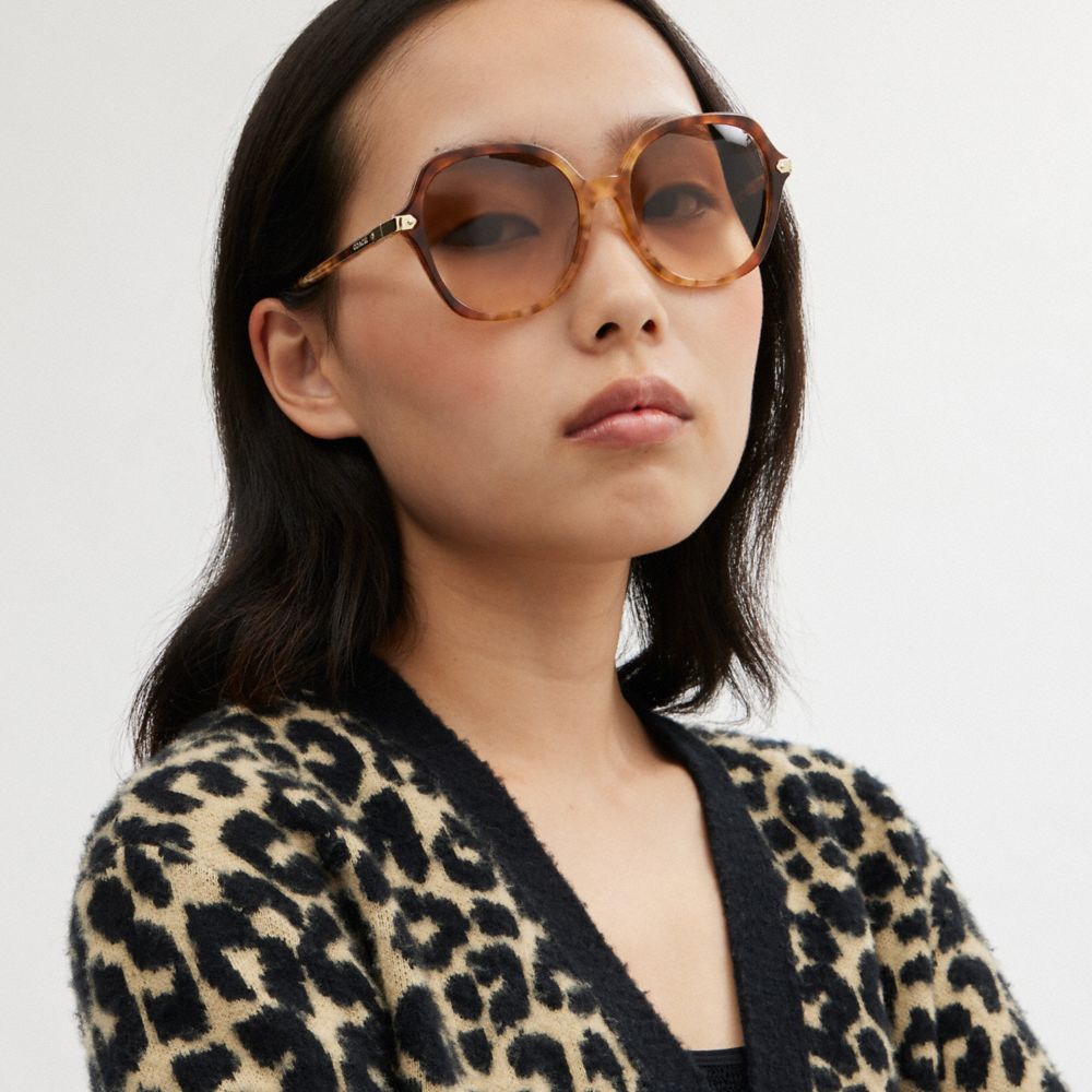 COACH®,Wrap Around Hangtag Oversized Geometric Round Sunglasses,Square,Tortoise,Logo,Metal,Integrated Nose Pads,Casual,Brown,Angle View