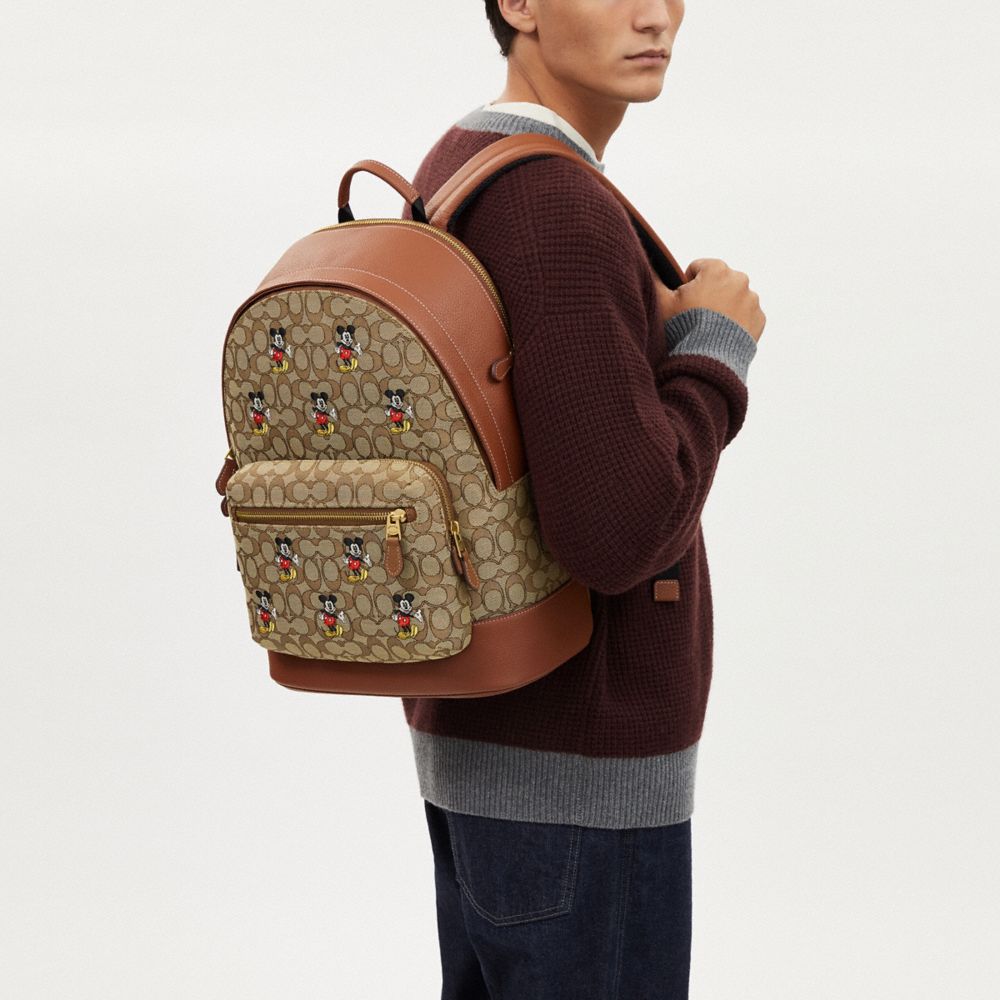 COACH® | Disney X Coach West Backpack In Signature Jacquard With