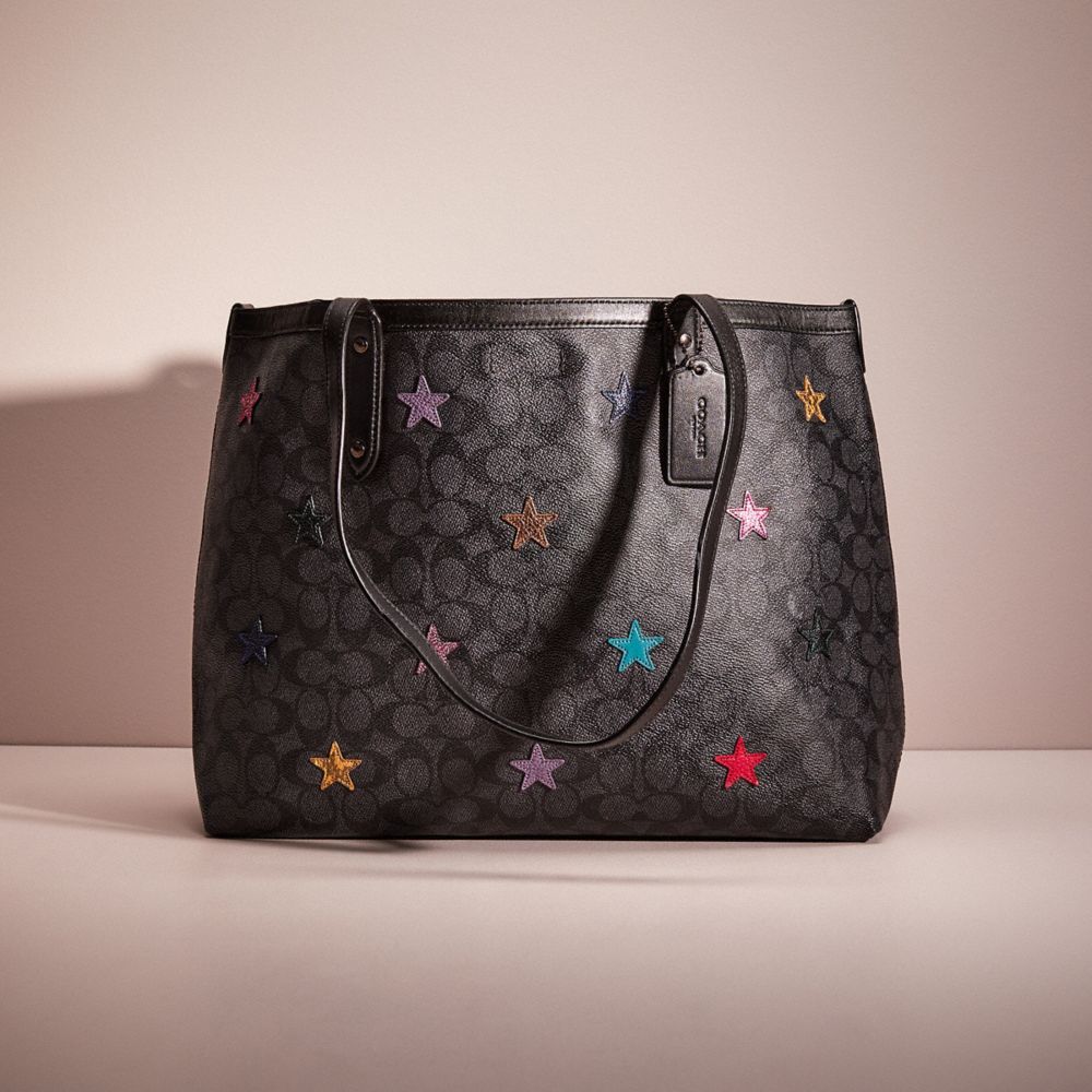 COACH Central Tote In Signature Canvas With Star Applique And Snakeskin  Detail in Black