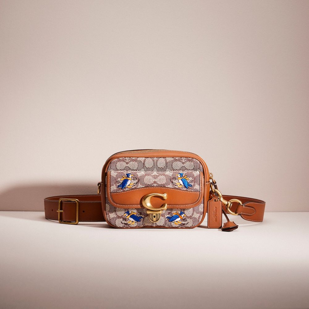 COACH®,RESTORED STUDIO CAMERA BAG 18 IN SIGNATURE TEXTILE JACQUARD WITH CREATURES,Glovetanned Leather,Blue Bird,Front View