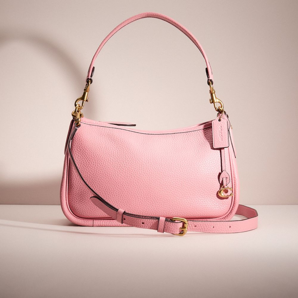 COACH®,RESTORED CARY CROSSBODY,Polished Pebble Leather,Medium,Brass/Bubblegum,Front View