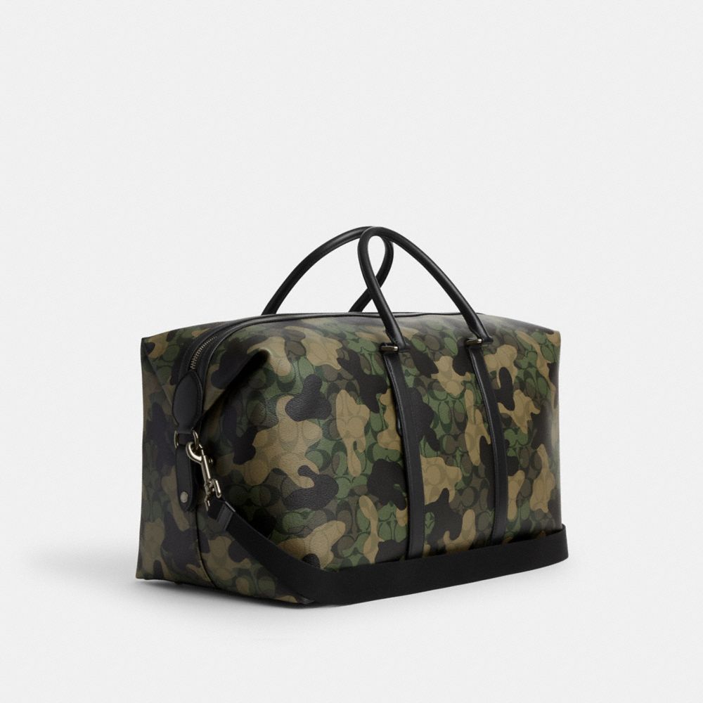 COACH®,TREKKER BAG 52 IN SIGNATURE CANVAS WITH CAMO PRINT,X-Large,Travel,Gunmetal/Green Multi,Angle View