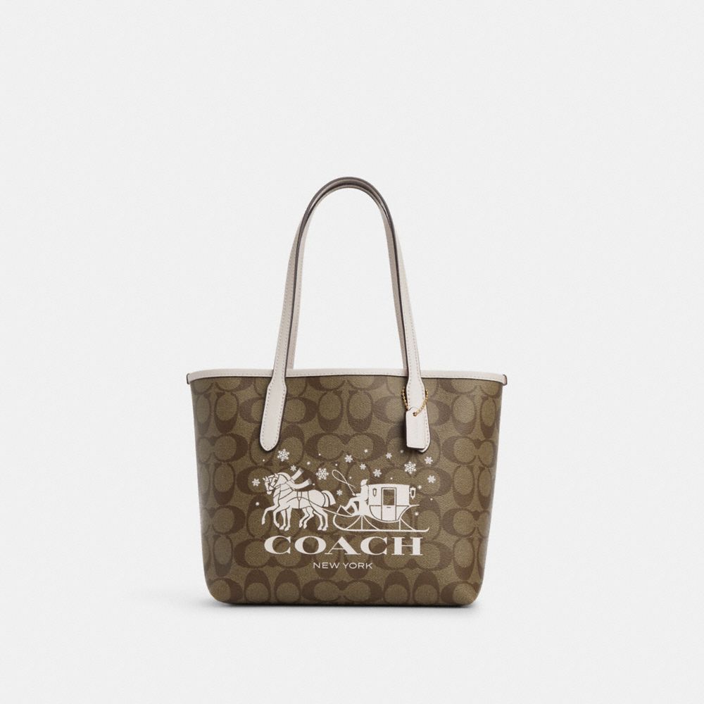 COACH®,MINI CITY TOTE IN SIGNATURE CANVAS WITH HORSE AND SLEIGH,Signature Canvas,Medium,Gold/Khaki/Chalk,Front View