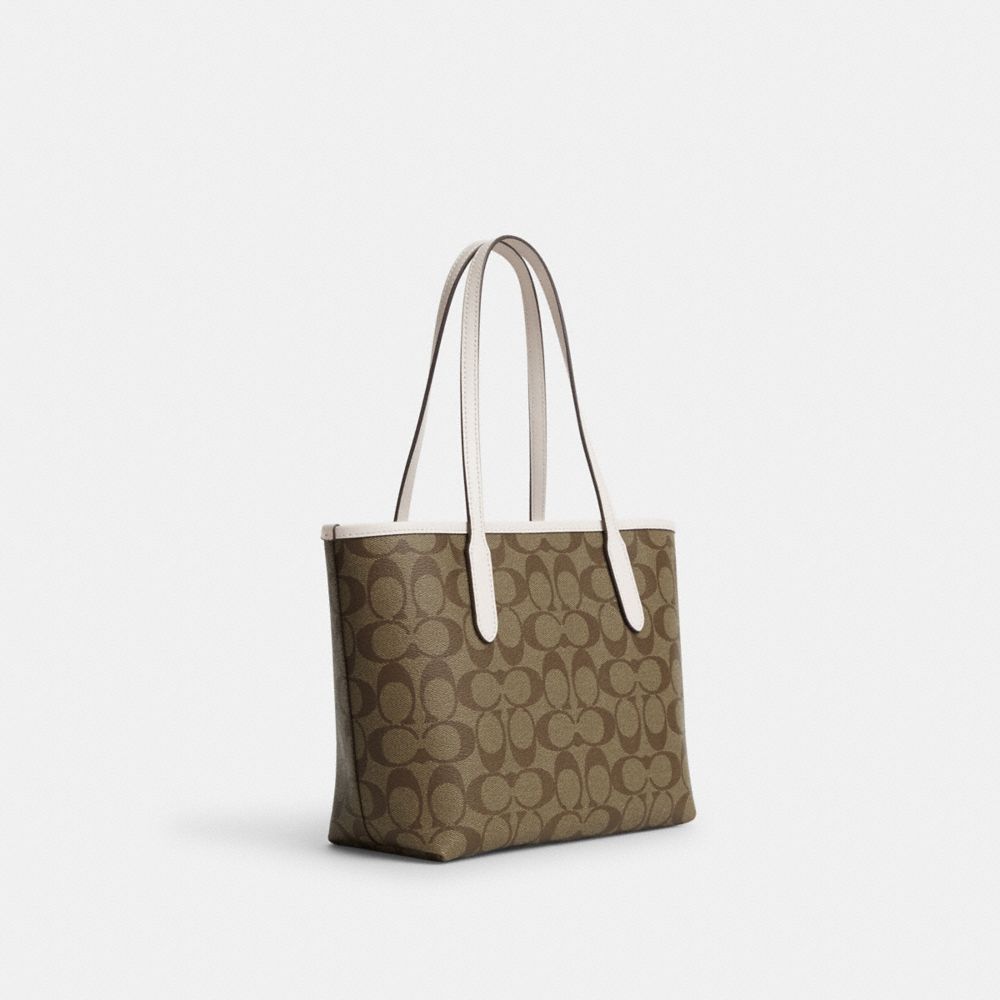 COACH®,MINI CITY TOTE IN SIGNATURE CANVAS WITH HORSE AND SLEIGH,Signature Canvas,Medium,Gold/Khaki/Chalk,Angle View