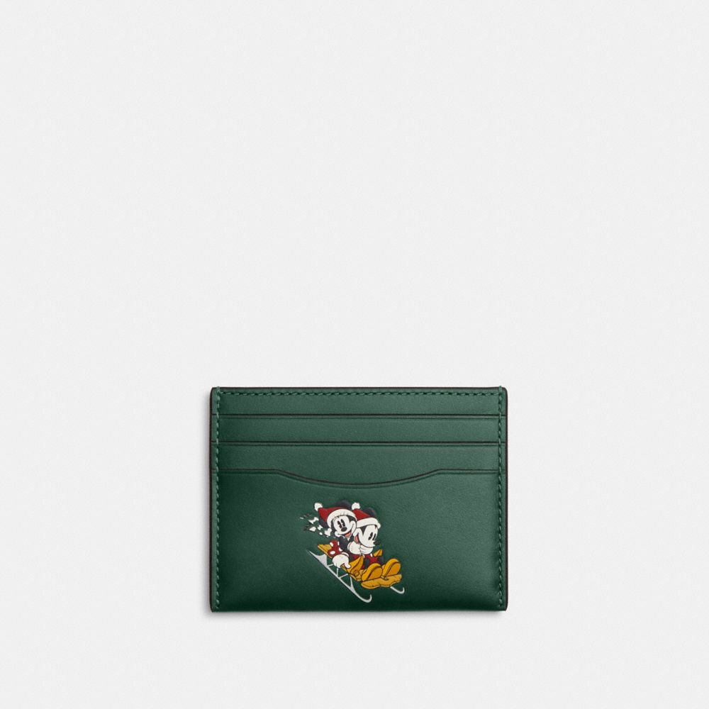 COACH®,DISNEY X COACH SLIM ID CARD CASE WITH WINTER MOTIF,Novelty Leather,Gunmetal/Dark Pine Multi,Front View image number 0