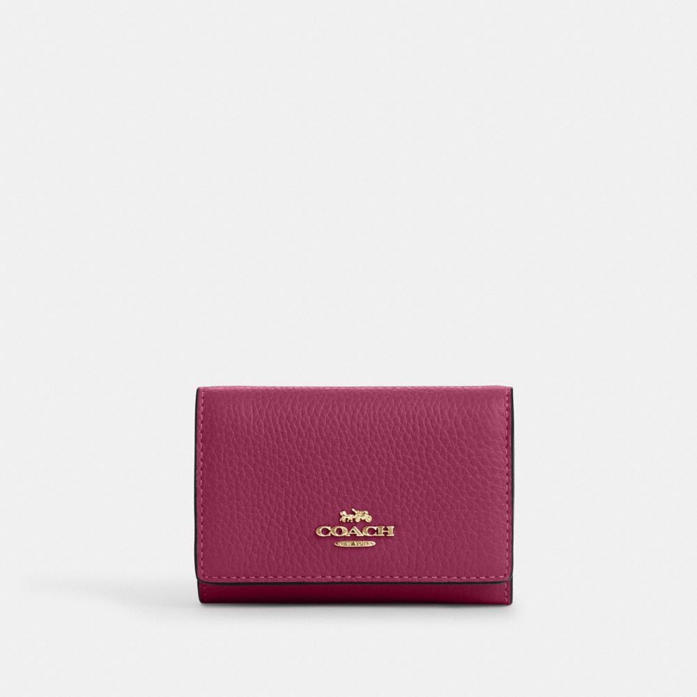 Pink coach wallet deals