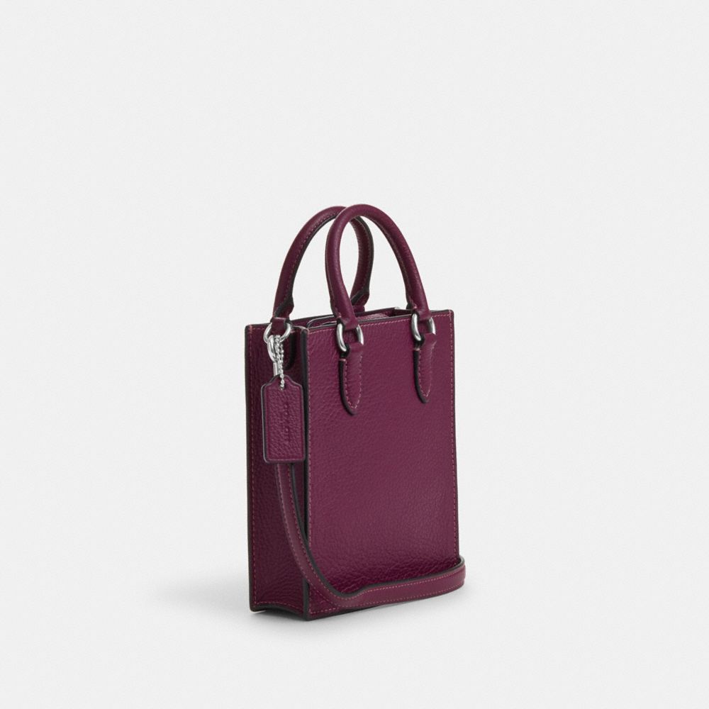 COACH®,NORTH SOUTH MINI TOTE WITH RIVETS,Novelty Leather,Mini,Silver/Deep Berry,Angle View
