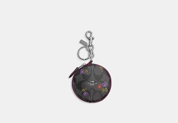 COACH®,CIRCULAR COIN POUCH IN SIGNATURE CANAS WITH COUNTRY FLORAL PRINT,pvc,Silver/Graphite/Deep Berry,Front View
