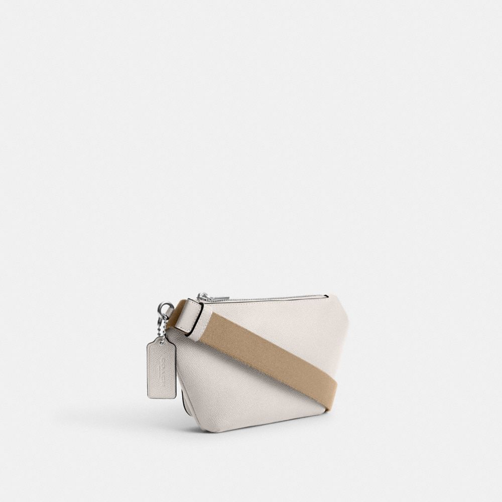 COACH®,BELT BAG WITH SIGNATURE CANVAS INTERIOR DETAIL,Crossgrain Leather,Mini,Chalk,Angle View