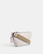 COACH®,BELT BAG WITH SIGNATURE CANVAS INTERIOR DETAIL,Crossgrain Leather,Mini,Chalk,Angle View