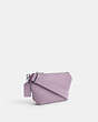 COACH®,BELT BAG WITH SIGNATURE CANVAS INTERIOR DETAIL,Crossgrain Leather,Mini,Soft Purple,Angle View