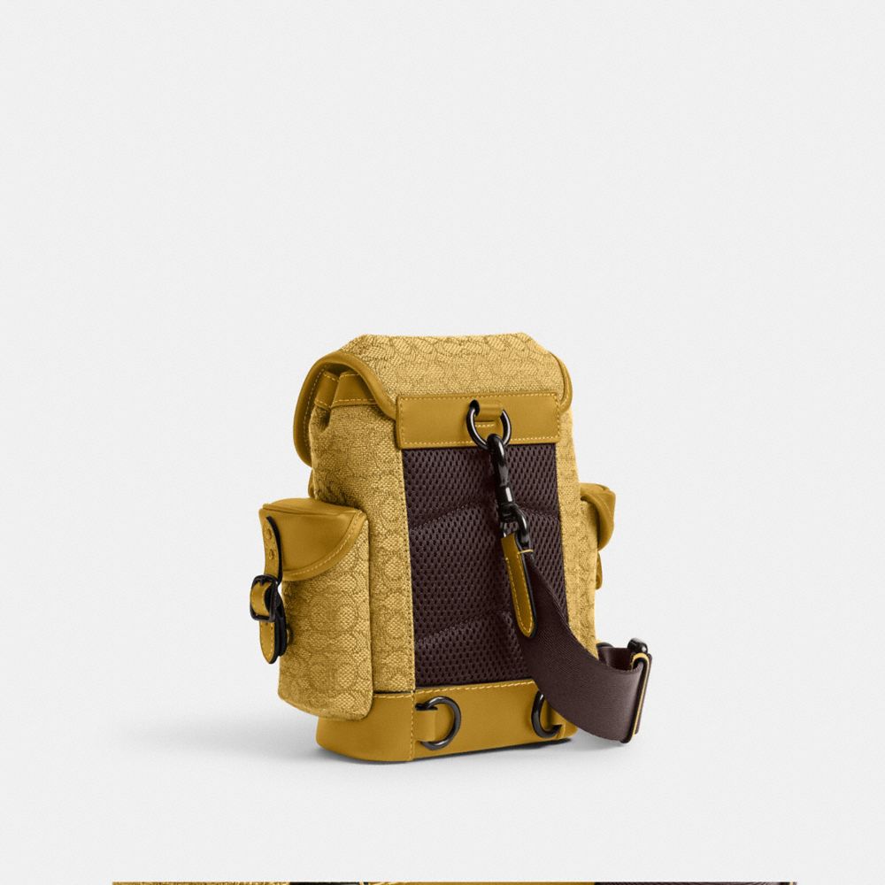 COACH®,Hitch Backpack 13 In Micro Signature Jacquard,Calfskin Leather,Slingback,Leather Embellishment,Belt,Casual,Mustard,Angle View