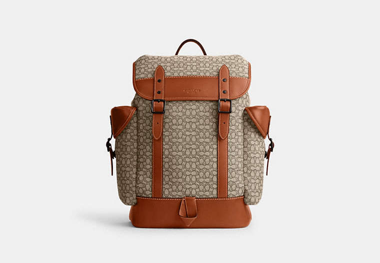 COACH®,HITCH BACKPACK IN MICRO SIGNATURE JACQUARD,Signature Jacquard,X-Large,Cocoa/Burnished Amber,Front View image number 0